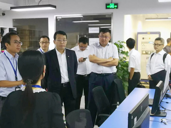 热烈欢迎广汽集团总经理冯兴亚一行来访